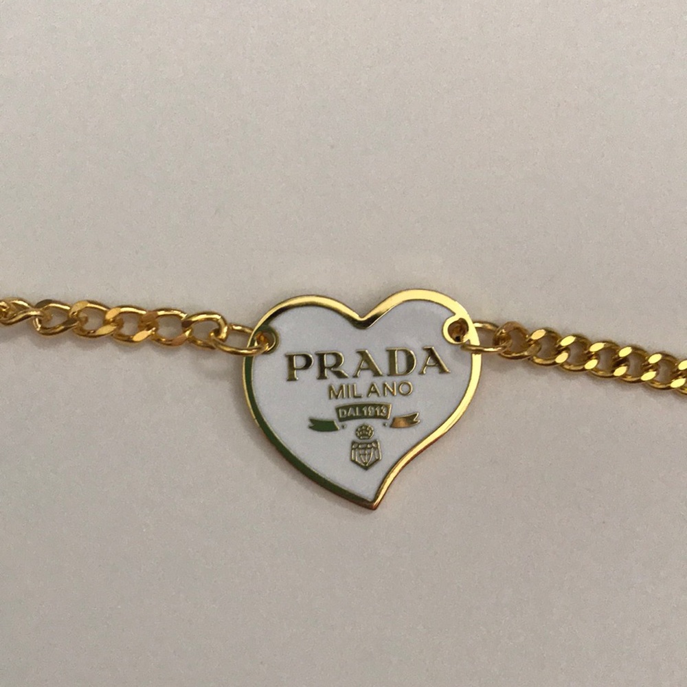 white and gold reworked prada necklace
